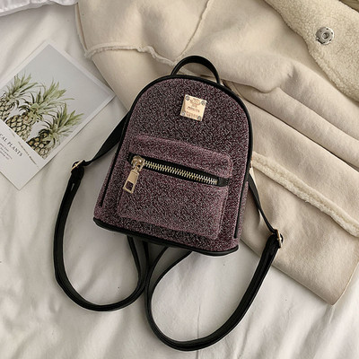 Modern női hátizsák több színben, fém díszítéssel