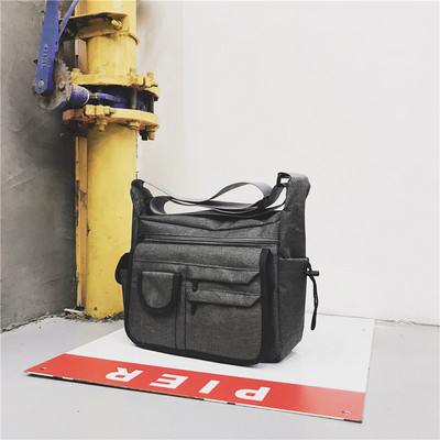 Praktikus férfi táska több zsebbel, három színben