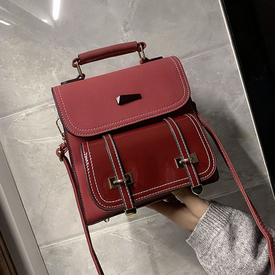 Modern női hátizsák több színben, fém elemmel