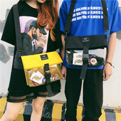 Modern táska elülső zsebbel, négy színben