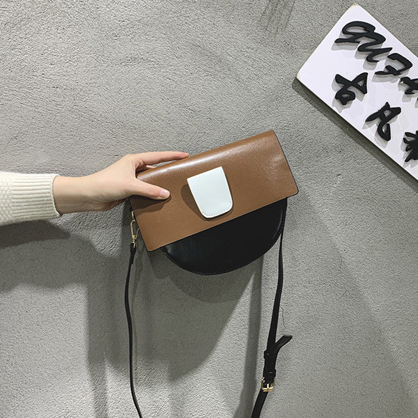 Modern női táska három színben, fém elemmel