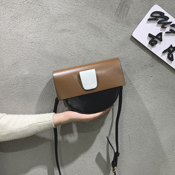 Modern női táska három színben, fém elemmel