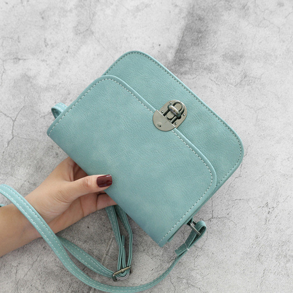 HIT Női táska fém rögzítéssel több színben