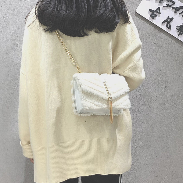 Aktuális női pehelytáska medállal, két méretben