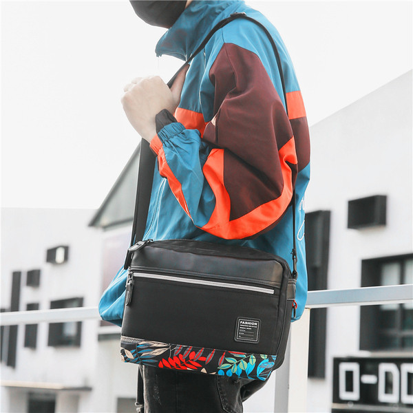 Aktuális férfi táska fekete színben virágos motívumokkal