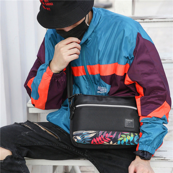 Aktuális férfi táska fekete színben virágos motívumokkal