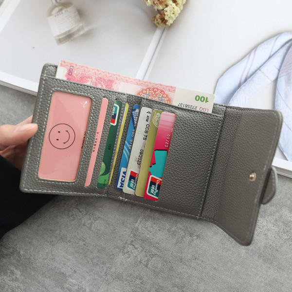 Női mini pénztárca csattal több színben