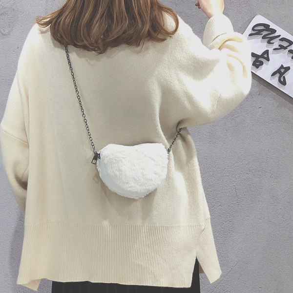 Női kis pehelytáska cipzárral több színben