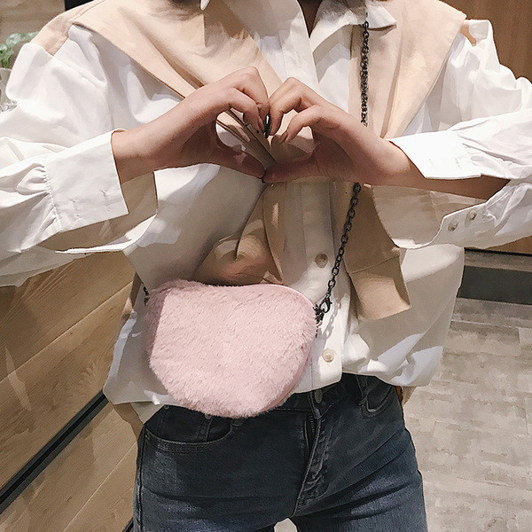 Női kis pehelytáska cipzárral több színben