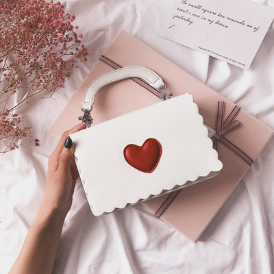 Μοντέρνα  γυναικεία τσάντα με πολλά χρώματα