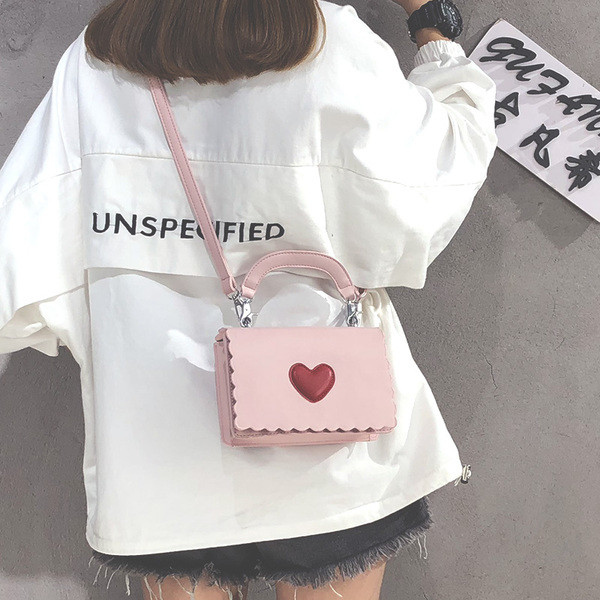 Μοντέρνα  γυναικεία τσάντα με πολλά χρώματα