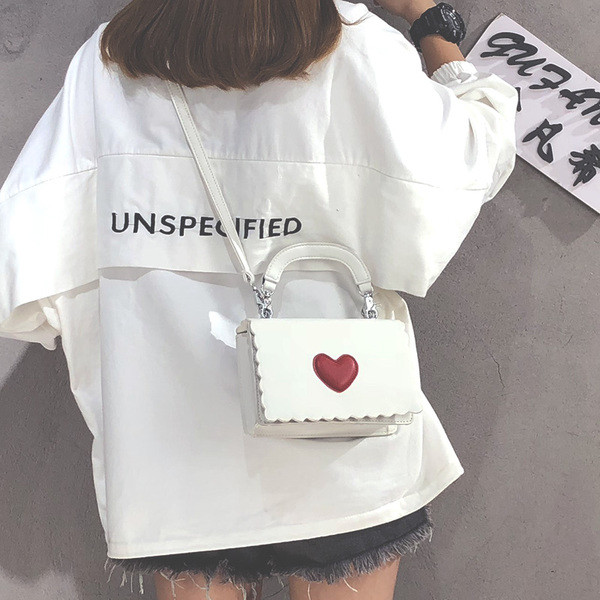 Μοντέρνα  γυναικεία τσάντα με πολλά χρώματα