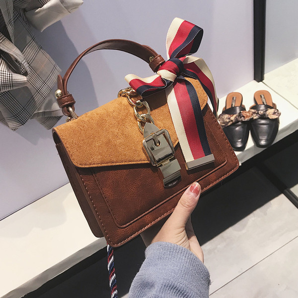 Modern női táska fém csattal, három színben