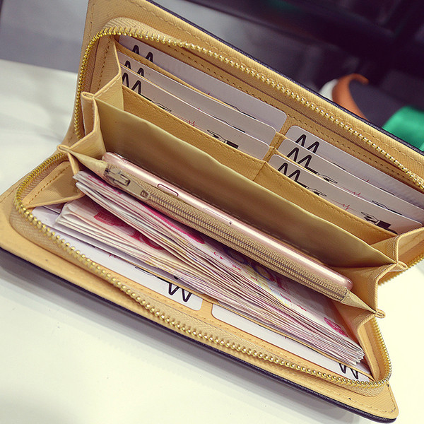 Stílusos női pénztárca cipzárral fehér és fekete színben