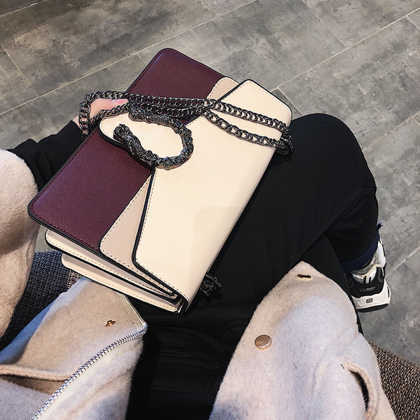 Stílusos női táska hosszú füllel, három színben