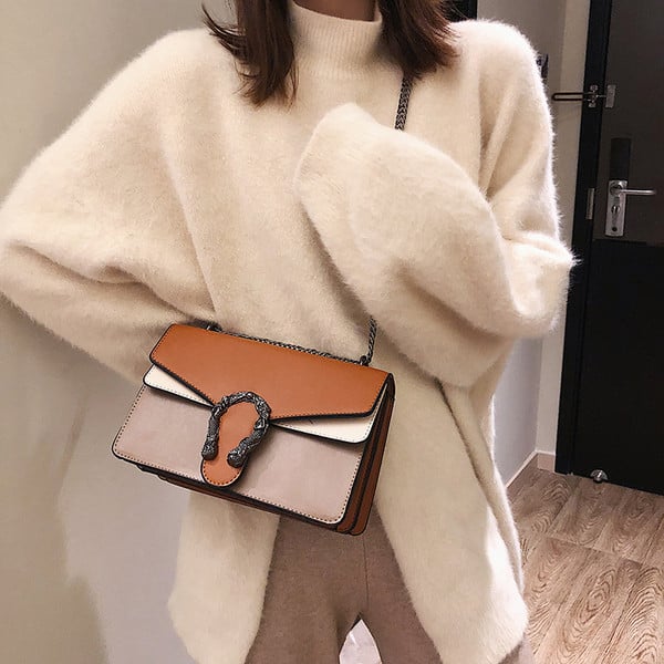 Stílusos női táska hosszú füllel, három színben