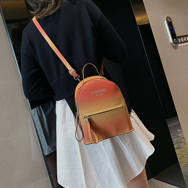 Modern női hátizsák több színben felirattal