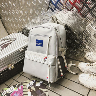 Férfi hátizsák felirattal és nyakkendővel négy színben