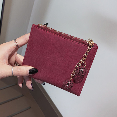 Γυναικείο μίνι χαρτοφυλάκιο με αξεσουάρ σε διάφορα χρώματα