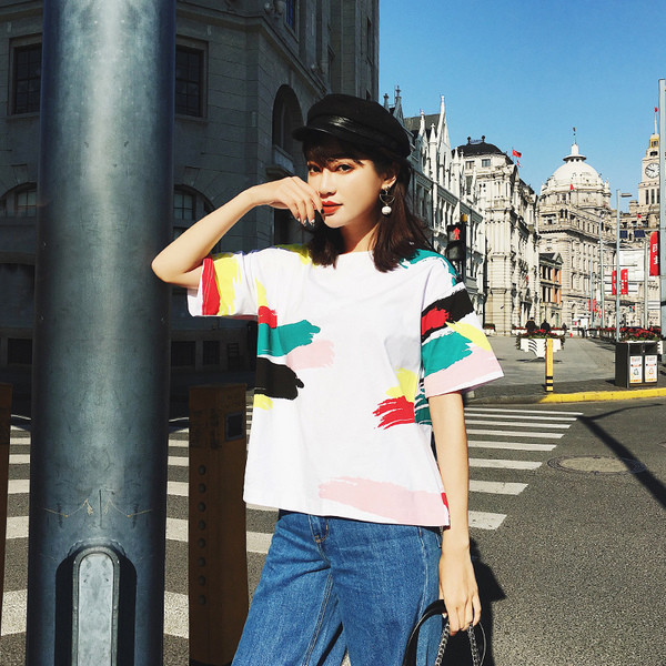 Modern női blúz rövid ujjal, fehér színben