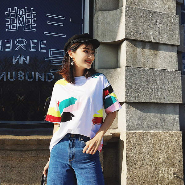 Modern női blúz rövid ujjal, fehér színben