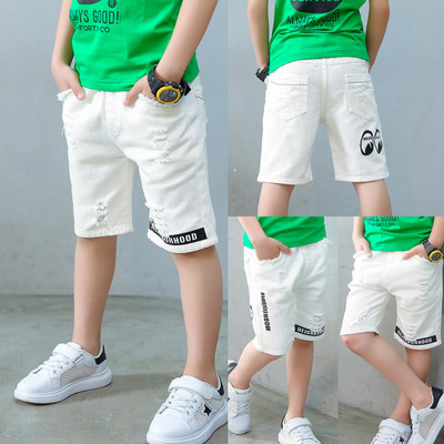 Модерен детски панталон в бял цвят с апликация 
