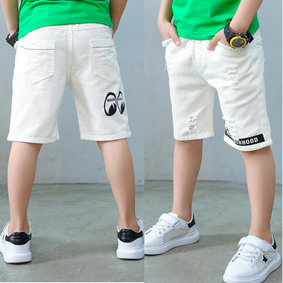 Modern fehér színű gyereknadrág rátéttel