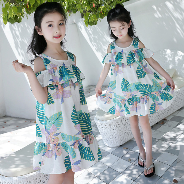 Gyerekruha lányoknak fehér színben, virágos motívumokkal