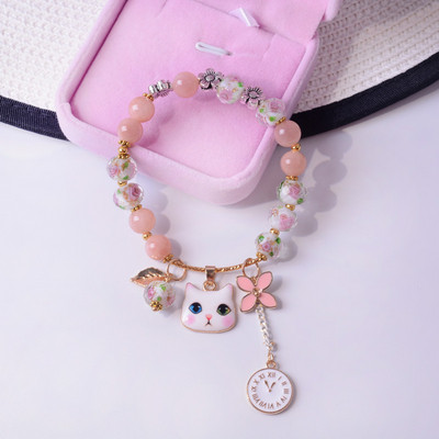 Γυναικείο βραχιόλι με χάντρες και μενταγιόν σε δύο χρώματα