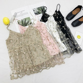 Virágos hímzéssel ellátott női felső, több színben