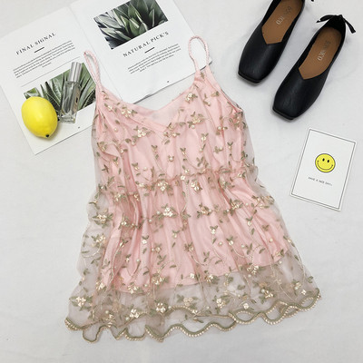 Virágos hímzéssel ellátott női felső, több színben