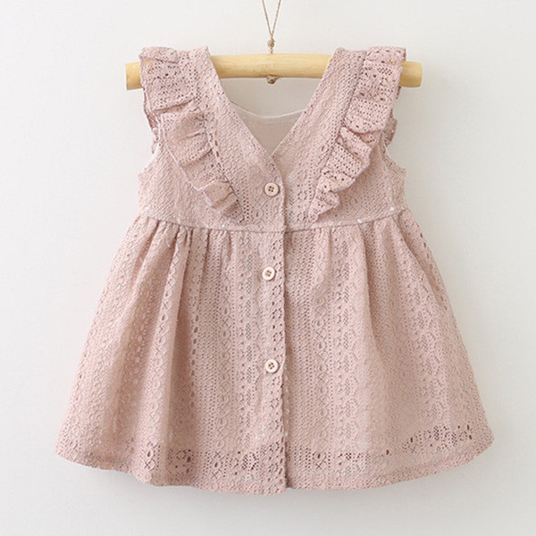 Stílusos gyerekruha modell gombokkal