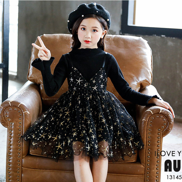 Modern gyerekruha fekete színben, hosszú ujjal és tüllrel