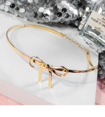 Colier modern de dama de culoare aurie cu element de panglica