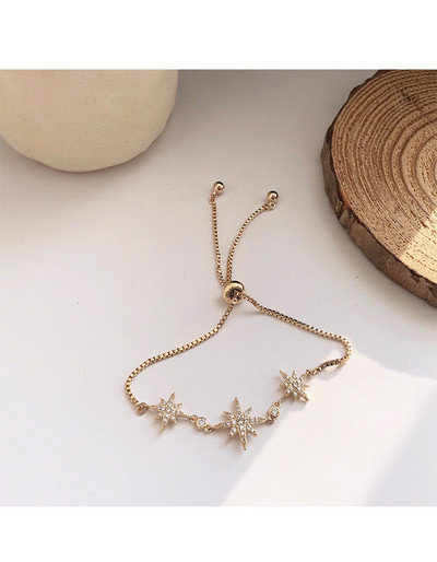 Дамска стилна гривна в златист цвят с декоративни камъни