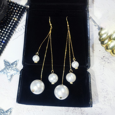 Arany és ezüst hosszú női fülbevaló gyöngyökkel