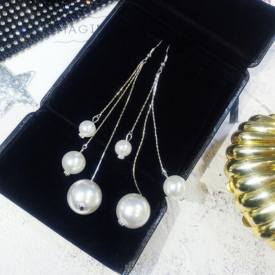 Arany és ezüst hosszú női fülbevaló gyöngyökkel