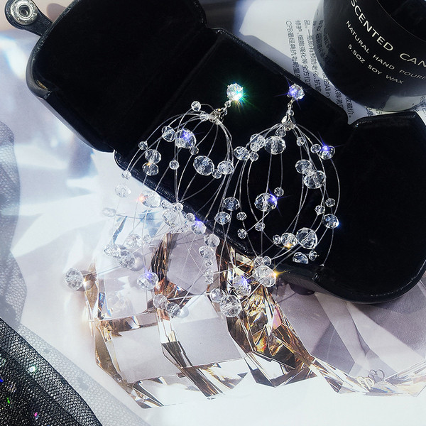 Cercei eleganti de dama de culoare argintie cu pietre decorative