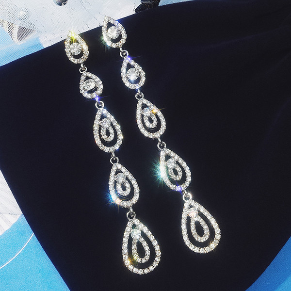 Hosszú női fülbevaló kövekkel ezüst és arany színben