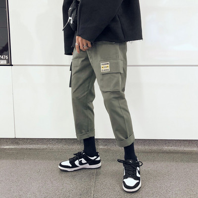 Férfi alkalmi nadrág három színben emblémával