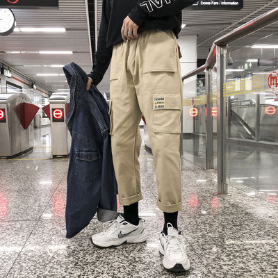 Férfi alkalmi nadrág három színben emblémával