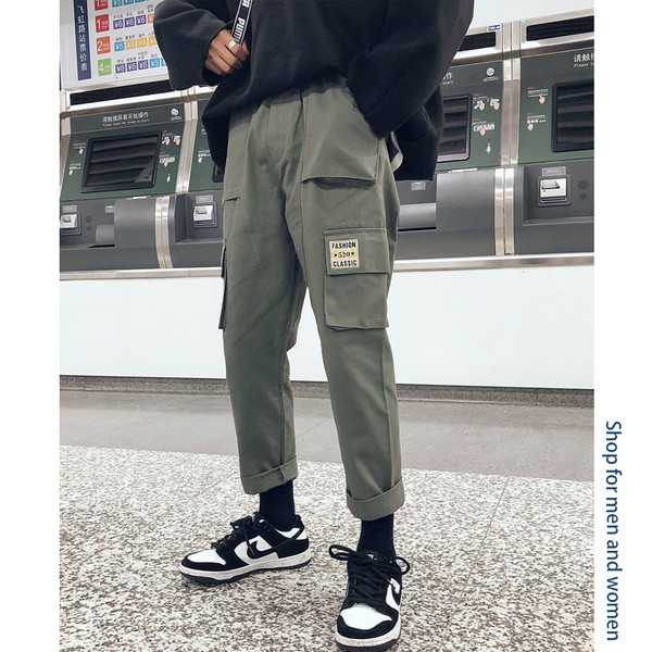 Férfi alkalmi nadrág három színben emblémával