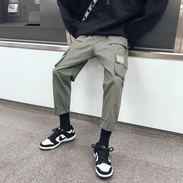 Férfi alkalmi nadrág három színben emblémával