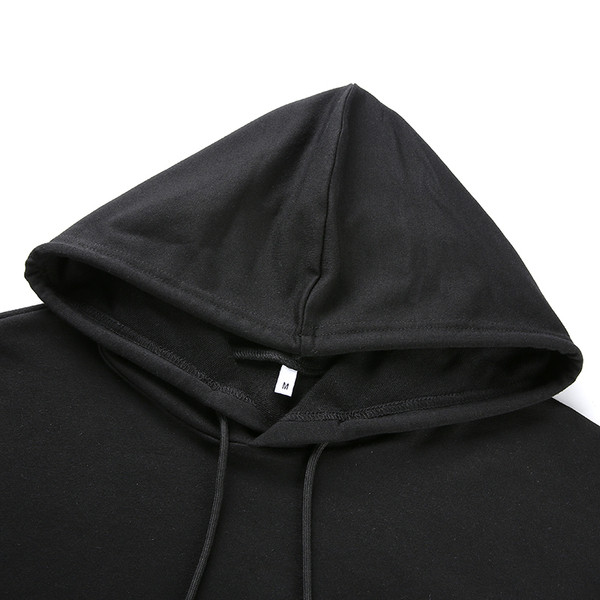 Modern női pulóver fekete mintával