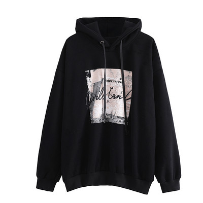 Női széles pulóver fekete-fehér mintával