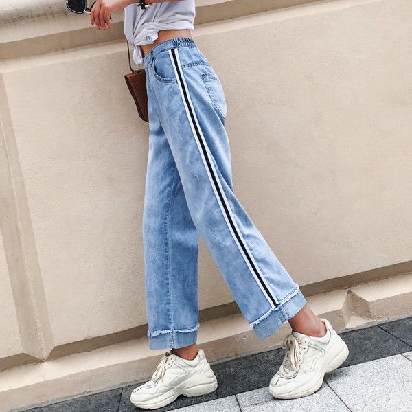 Modern női farmer széles modell fekete szegéllyel