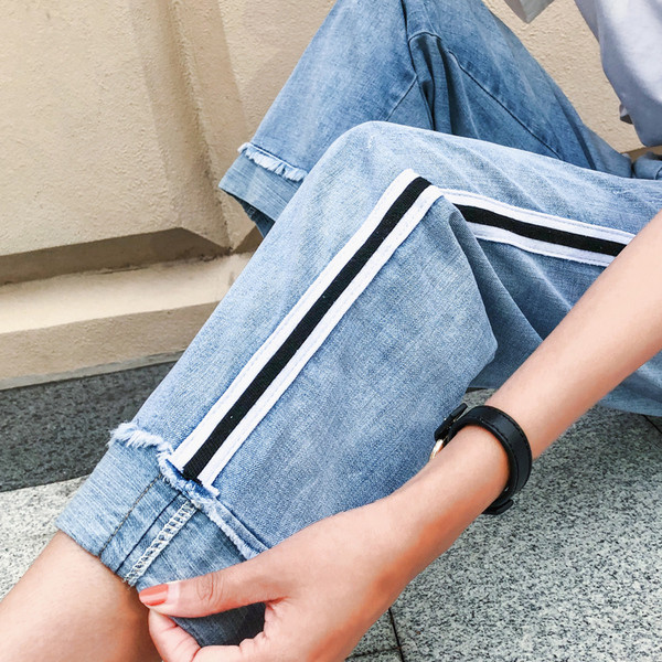 Modern női farmer széles modell fekete szegéllyel