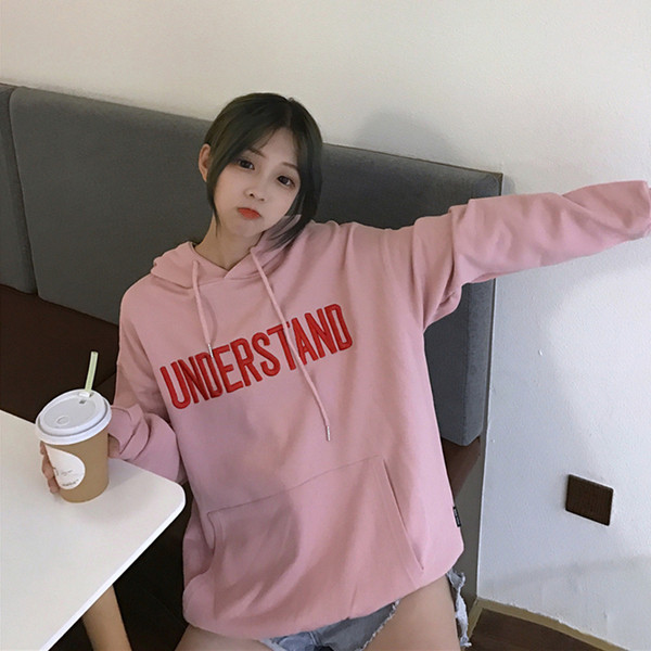 Női pulóver rózsaszín és fehér felirattal