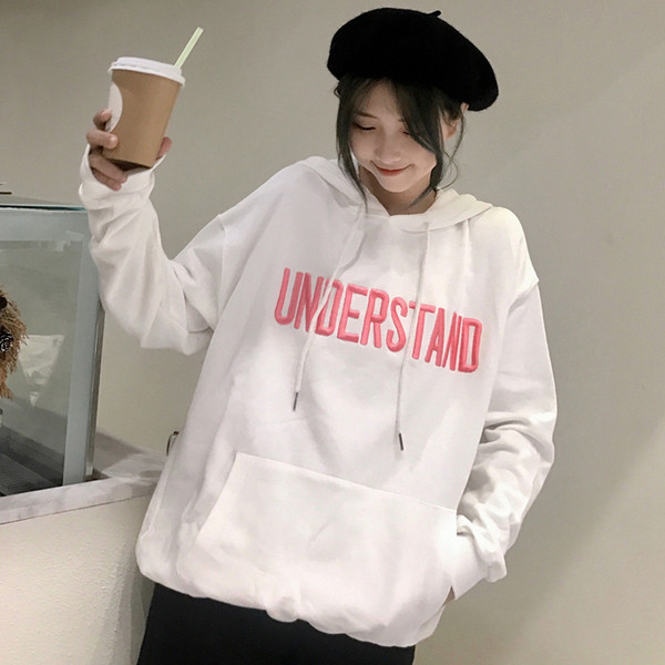 Női pulóver rózsaszín és fehér felirattal