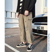 Lezser férfi nadrág, zsebekkel, szakadt motívumokkal